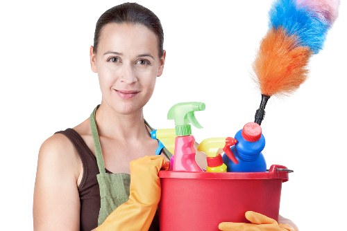Airbnb cleaner preparing a guest-ready flat in W3