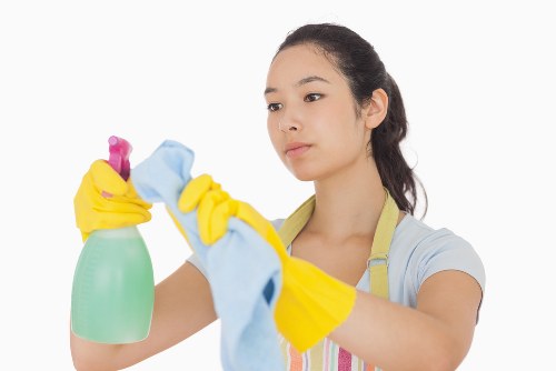 A cleaner dusting and refreshing a room in a W3 property