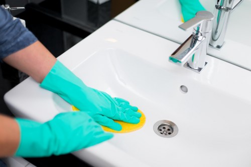 Bathroom and living area cleaning in a W3 rental property