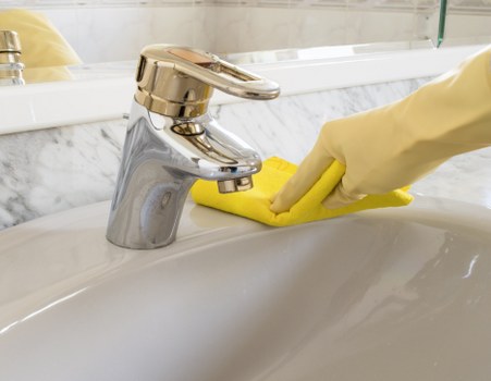 Local cleaners working through a W3 flat during a one-off clean